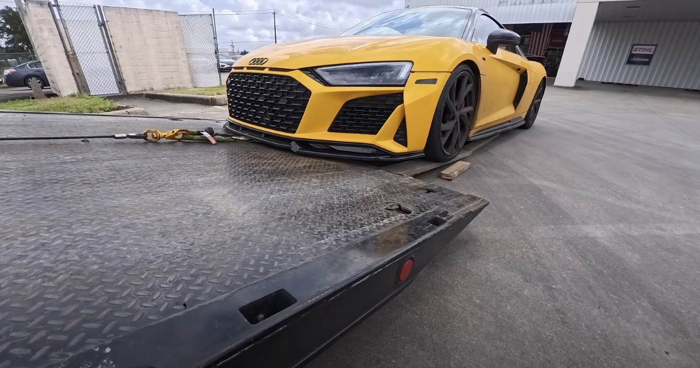 Professional flatbed towing service in Calexico, CA transporting sports car
